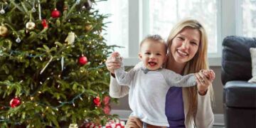 A single mom plays with her kid.