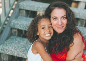 A portrait of a diverse mother and daughter.