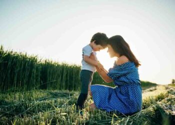 A little son resting on a mom